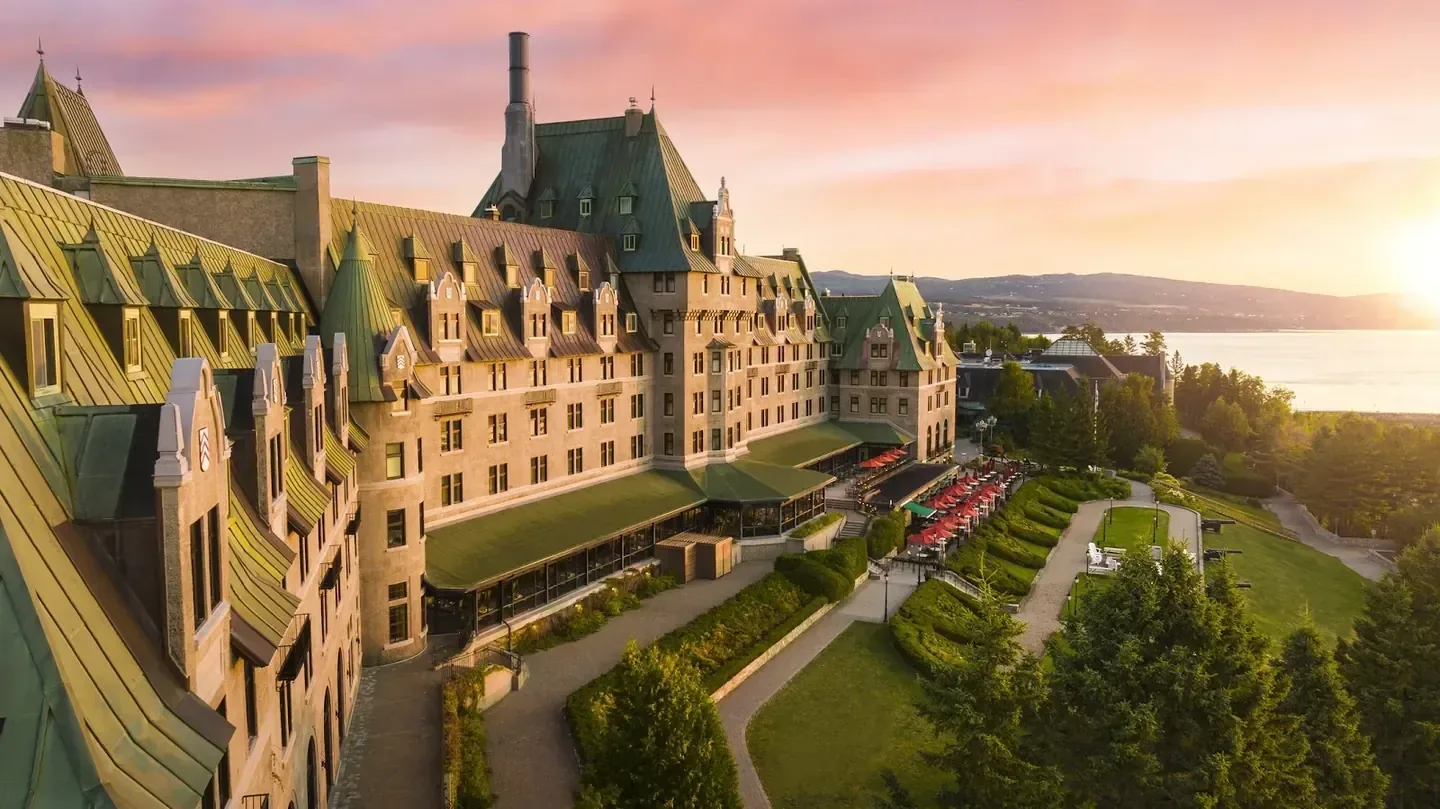 Historic waterfront resort façade under open sky